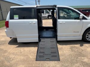 White Dodge Grand Caravan with BraunAbility Side Entry Automatic Fold Out conversion