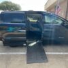 Black Chrysler Pacifica with Driverge Side Entry Automatic Fold Out conversion