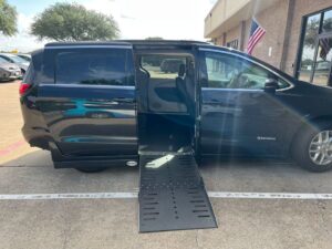 Black Chrysler Pacifica with Driverge Side Entry Automatic Fold Out conversion