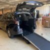 Blue Toyota Sienna with Driverge Rear Entry Manual Fold Out conversion