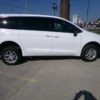 White Chrysler Voyager with FR Conversions Rear Entry Manual Fold Out conversion