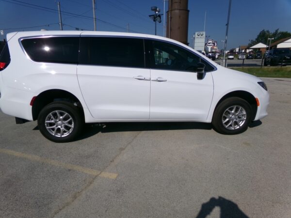 White Chrysler Voyager with FR Conversions Rear Entry Manual Fold Out conversion