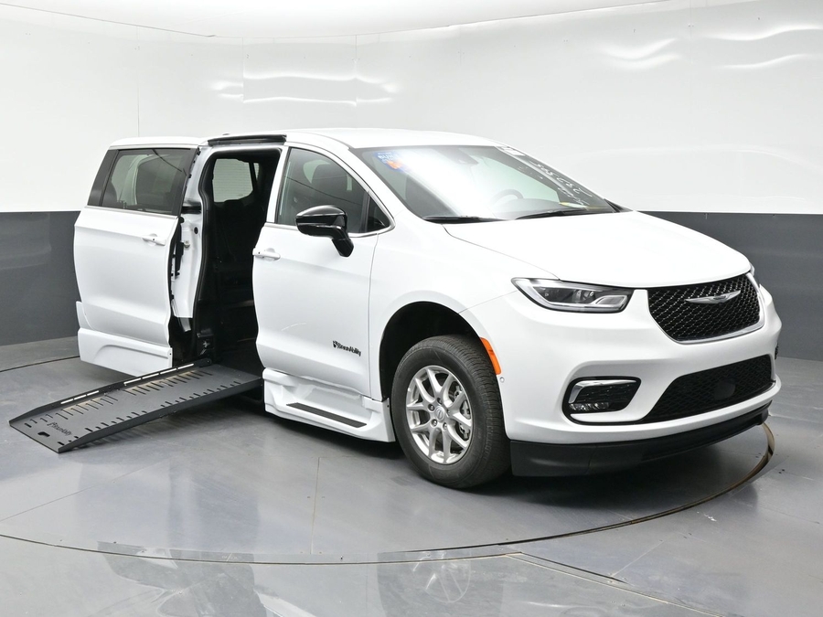 White Chrysler Pacifica with BraunAbility Side Entry Automatic Fold Out conversion