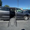 Grey Chrysler Voyager with BraunAbility Side Entry Manual Fold Out conversion