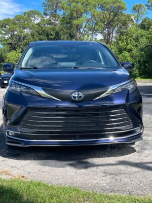 Blue Toyota Sienna with Driverge Rear Entry Manual Fold Out conversion