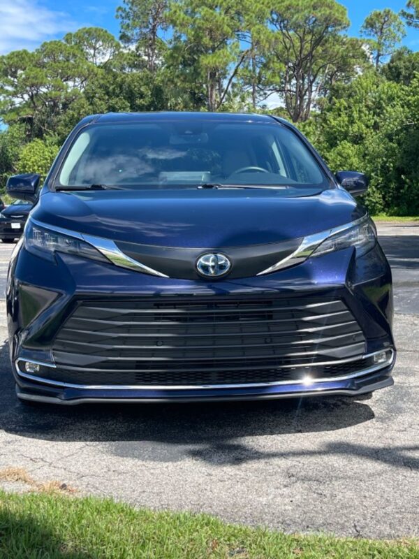 Blue Toyota Sienna with Driverge Rear Entry Manual Fold Out conversion