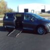 Grey Chrysler Pacifica with Adaptive Vans Side Entry Automatic Fold Out conversion