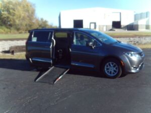 Grey Chrysler Pacifica with Adaptive Vans Side Entry Automatic Fold Out conversion