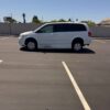 White Dodge Grand Caravan with BraunAbility Side Entry Automatic Fold Out conversion