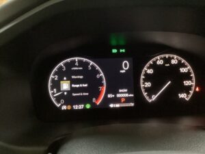 White Honda Odyssey with BraunAbility Side Entry Automatic In Floor conversion