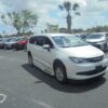 White Chrysler Voyager with BraunAbility Side Entry Automatic Fold Out conversion