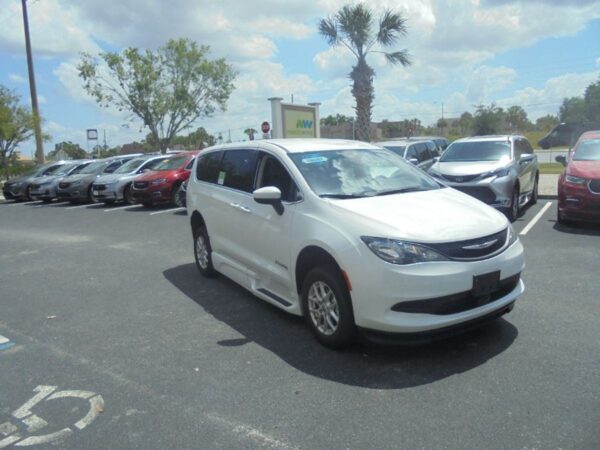 White Chrysler Voyager with BraunAbility Side Entry Automatic Fold Out conversion