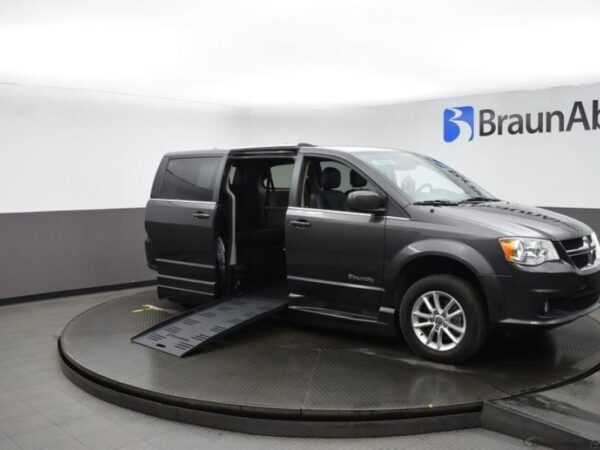 Grey Dodge Grand Caravan with BraunAbility Side Entry Automatic Fold Out conversion