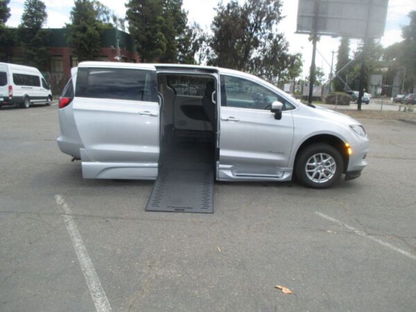 Silver Chrysler Voyager with BraunAbility Side Entry Automatic In Floor conversion