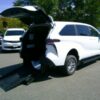 White Toyota Sienna with BraunAbility Rear Entry Manual Fold Out conversion