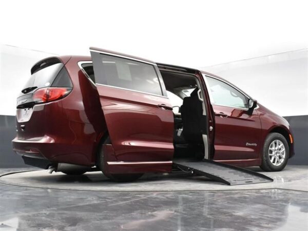 Red Chrysler Voyager with BraunAbility Side Entry Automatic Fold Out conversion