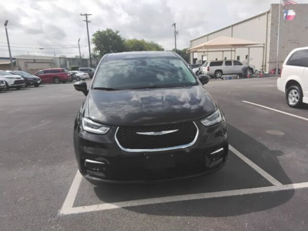 Black Chrysler Pacifica with Driverge Side Entry Automatic Fold Out conversion