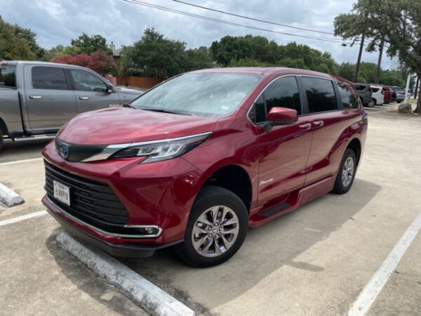 Red Toyota Sienna with BraunAbility Side Entry Automatic Fold Out conversion