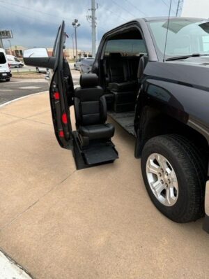 Grey Chevrolet Silverado 1500 with MobilitySVM Side Entry Automatic Fold Out conversion