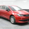 Red Chrysler Voyager with BraunAbility Rear Entry Manual Fold Out conversion