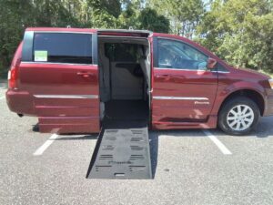 Red Chrysler Town and Country with BraunAbility Side Entry Automatic Fold Out conversion
