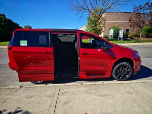 Red Chrysler Pacifica with BraunAbility Side Entry Automatic In Floor conversion