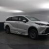 White Toyota Sienna with BraunAbility Side Entry Automatic Fold Out conversion