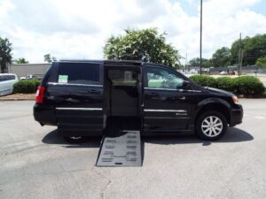 Black Chrysler Town and Country with BraunAbility Side Entry Automatic Fold Out conversion