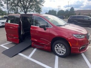 Red Chrysler Pacifica with Vantage Mobility Side Entry Automatic In Floor conversion