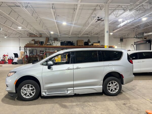 Silver Chrysler Voyager with BraunAbility Side Entry Automatic In Floor conversion