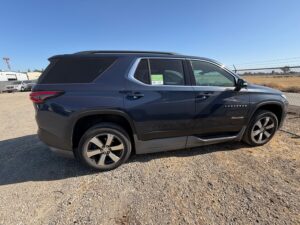 Blue Chevrolet Traverse with BraunAbility Side Entry Automatic In Floor conversion