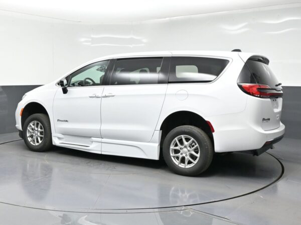 White Chrysler Pacifica with BraunAbility Side Entry Automatic Fold Out conversion