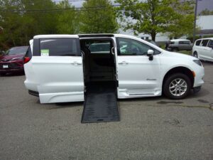 White Chrysler Voyager with BraunAbility Side Entry Automatic Fold Out conversion