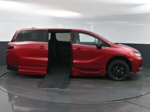 Red Honda Odyssey with BraunAbility Side Entry Automatic In Floor conversion