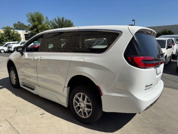 White Chrysler Pacifica with BraunAbility Side Entry Automatic Fold Out conversion