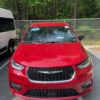 Red Chrysler Pacifica with BraunAbility Side Entry Automatic Fold Out conversion