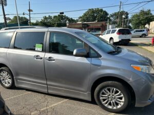 Silver Toyota Sienna with BraunAbility Side Entry Automatic Fold Out conversion