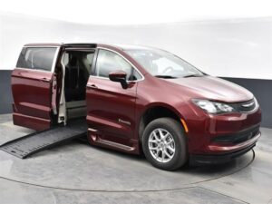 Red Chrysler Voyager with BraunAbility Side Entry Automatic Fold Out conversion