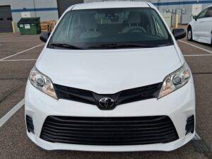 White Toyota Sienna with Driverge Rear Entry Manual Fold Out conversion