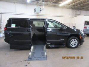Black Chrysler Voyager with BraunAbility Side Entry Automatic Fold Out conversion