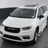 White Chrysler Pacifica with BraunAbility Side Entry Automatic Fold Out conversion