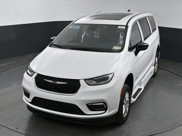 White Chrysler Pacifica with BraunAbility Side Entry Automatic Fold Out conversion