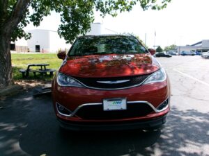 Orange Chrysler Pacifica with BraunAbility Side Entry Automatic Fold Out conversion