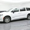 White Chrysler Voyager with BraunAbility Rear Entry Manual Fold Out conversion