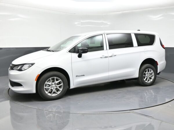 White Chrysler Voyager with BraunAbility Rear Entry Manual Fold Out conversion