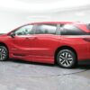 Red Honda Odyssey with BraunAbility Side Entry Automatic In Floor conversion