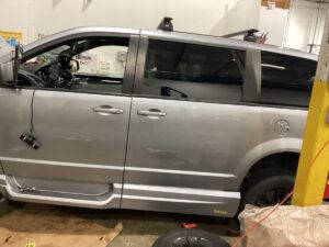 Silver Dodge Grand Caravan with Vantage Mobility Side Entry Automatic Fold Out conversion