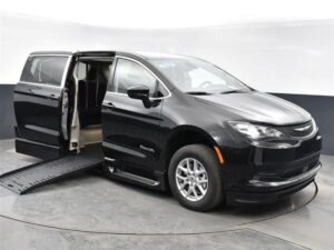 Black Chrysler Voyager with BraunAbility Side Entry Automatic Fold Out conversion