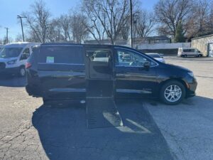 Black Chrysler Pacifica with Driverge Side Entry Automatic Fold Out conversion