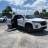 White Chevrolet Traverse with BraunAbility Side Entry Automatic In Floor conversion